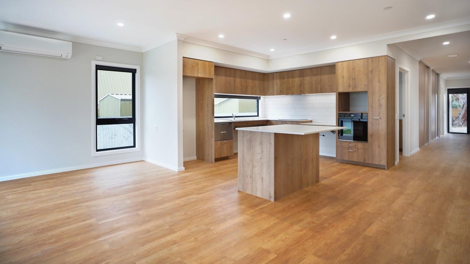Kingscote Residence with Open-Plan Living and Kitchen Areas